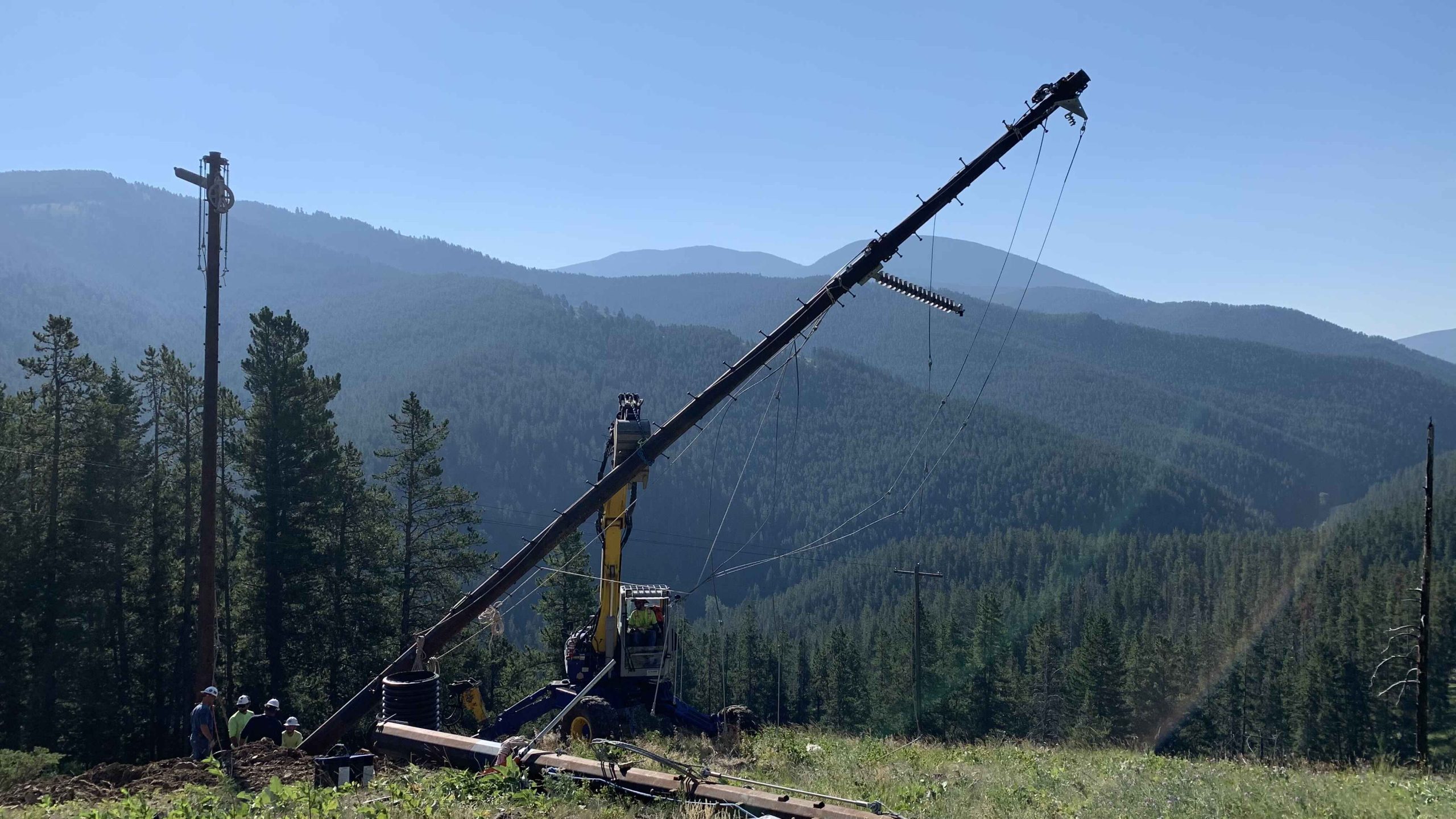 Spider Picking up pole during Pole Setting