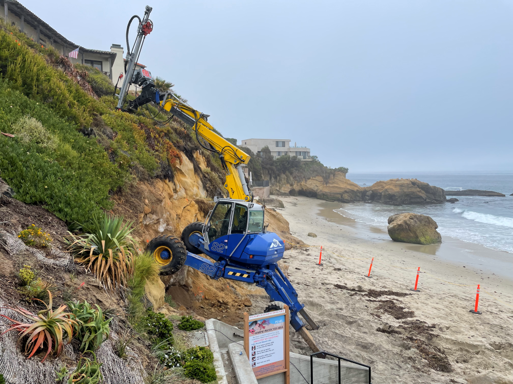 Spider Excavator on Beach
