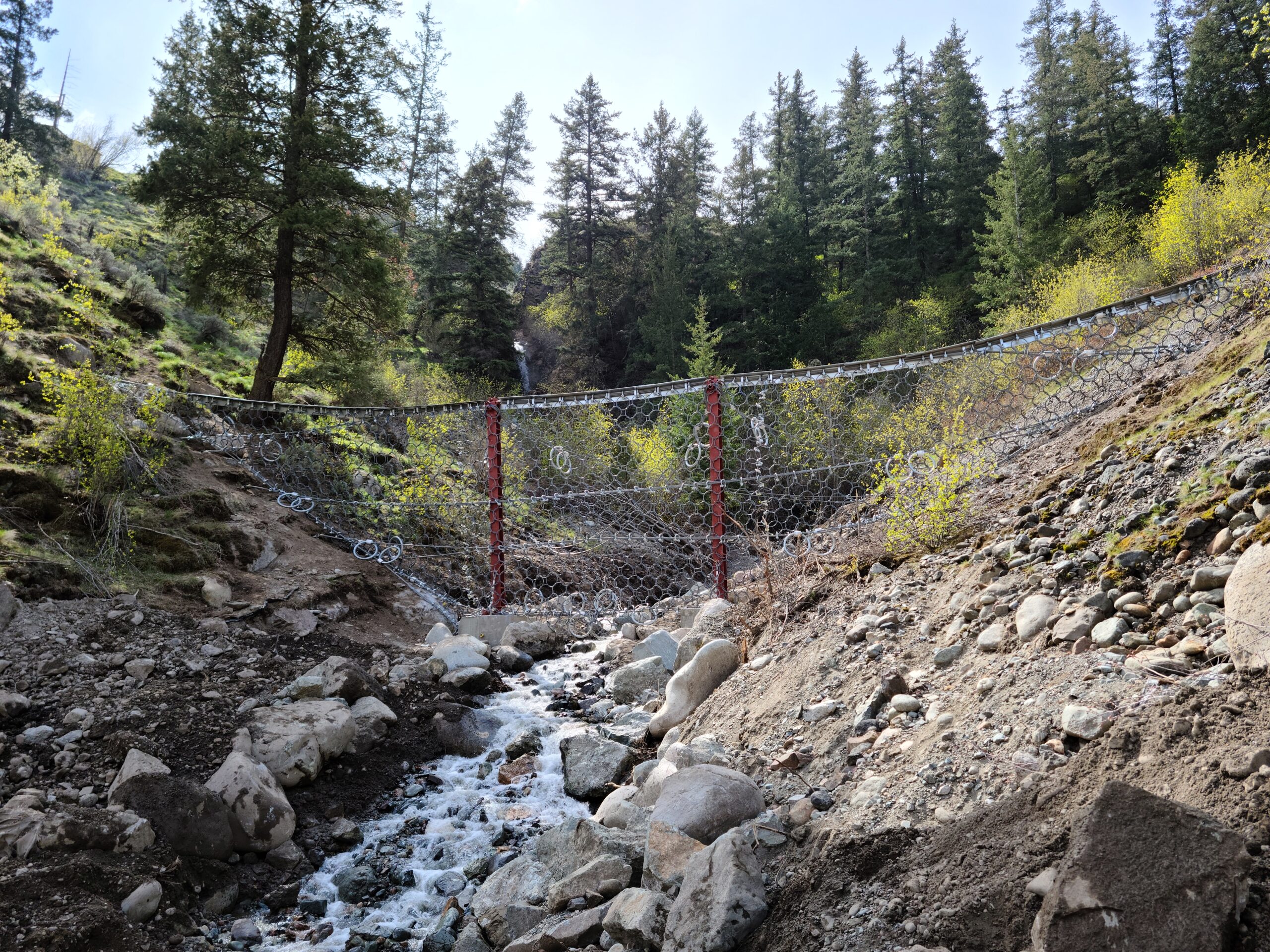 Flexible debris flow barrier.