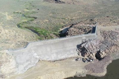 Aerial view of Willow Creek Reservoir in July 2018 showing the dam's completed concrete restoration