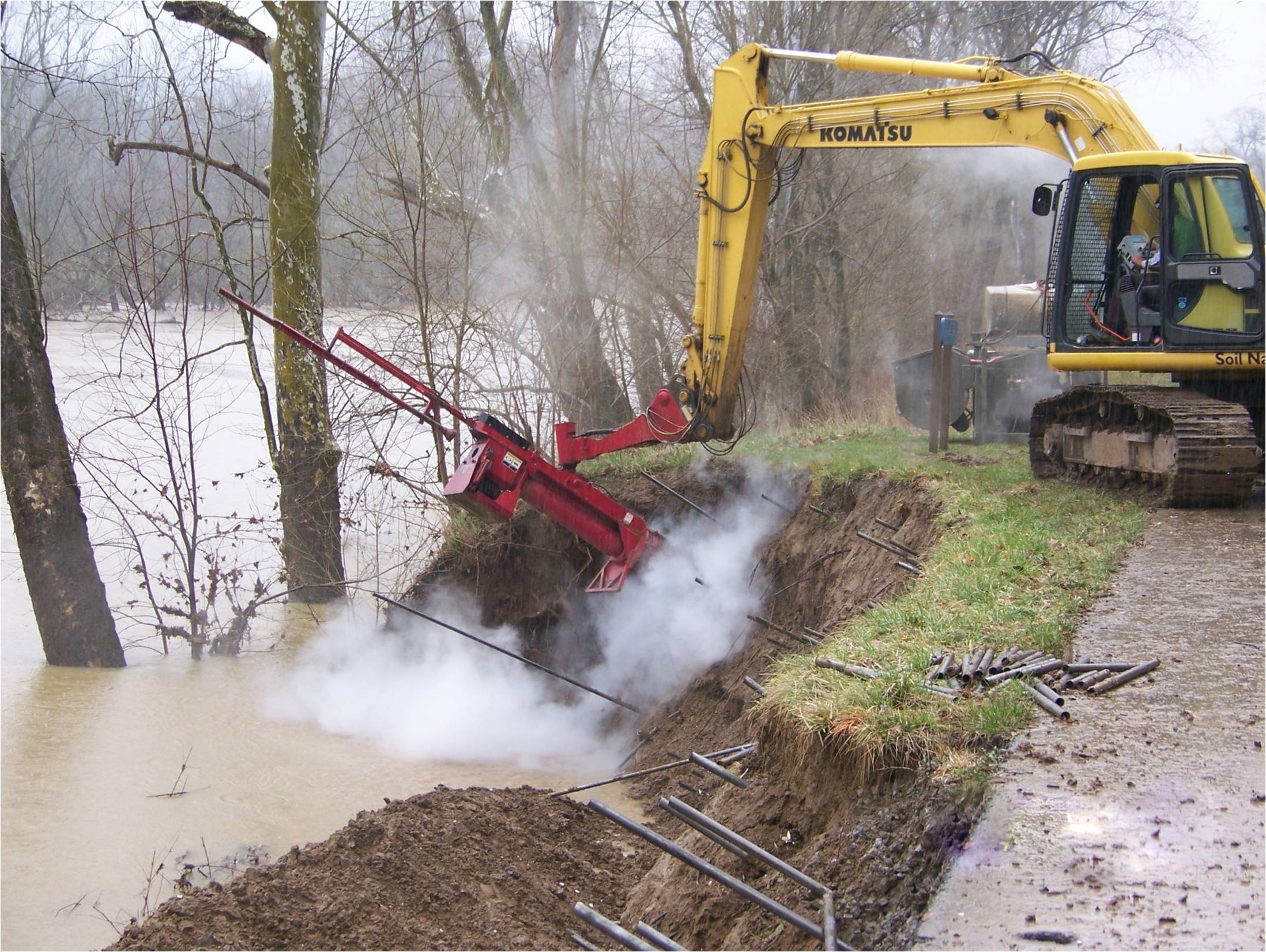 Soil nail launcher by river.