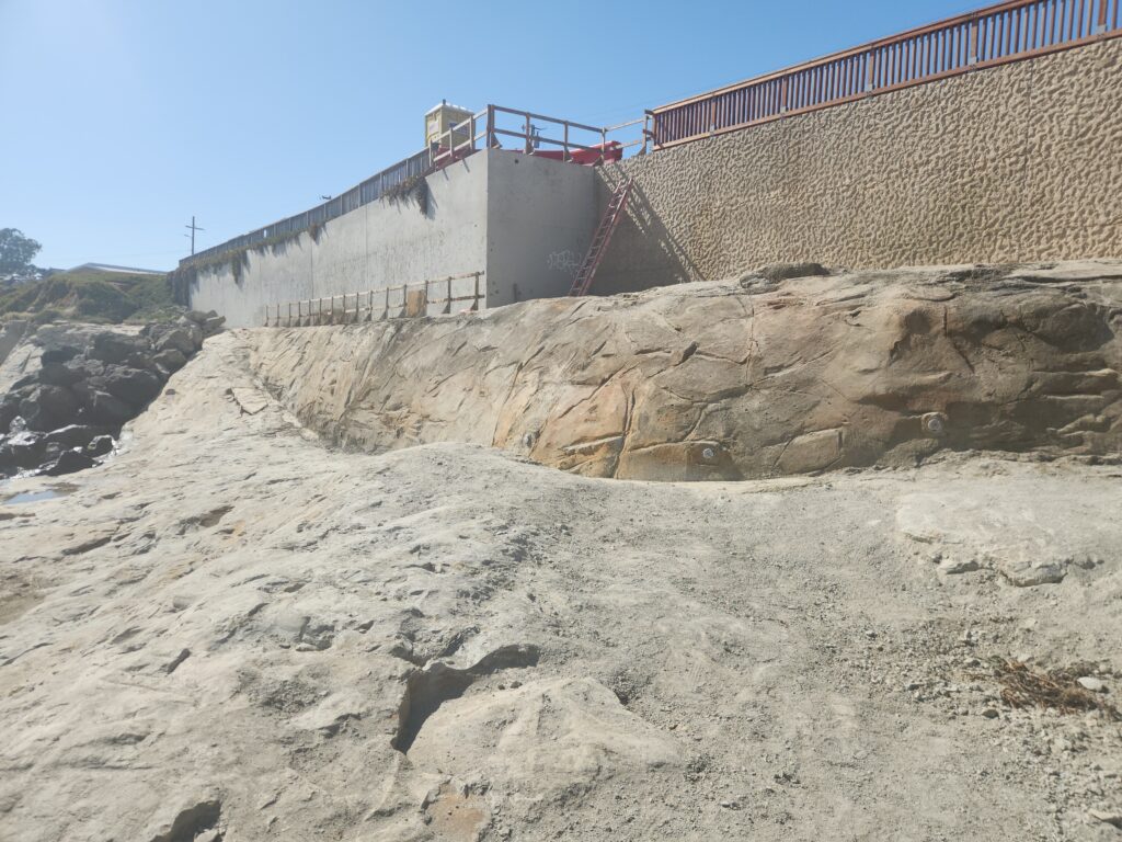 Shotcrete wall with a simple geologic finish.