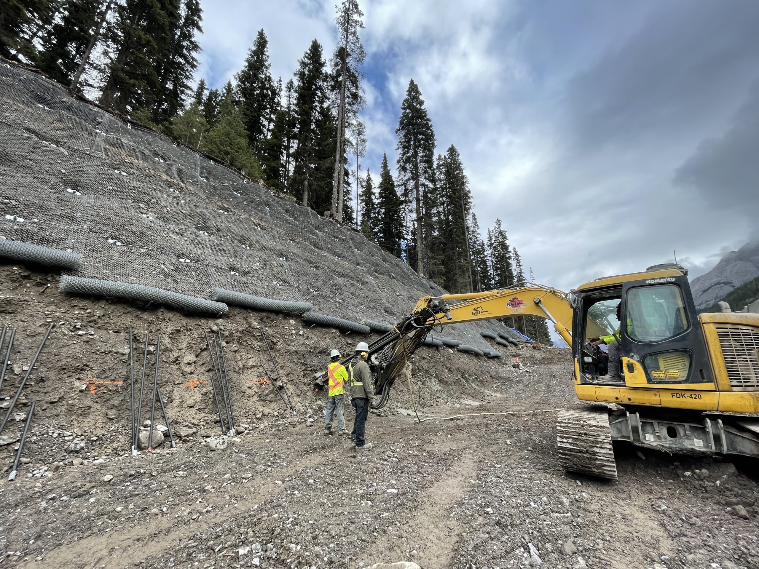 Sunshine Village Slope Stabilization installing mesh