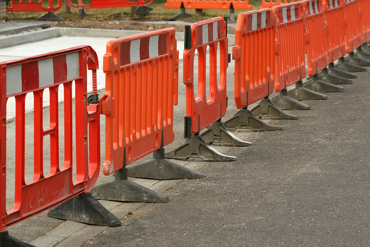 Temporary roadway concrete jersey barriers in work zone