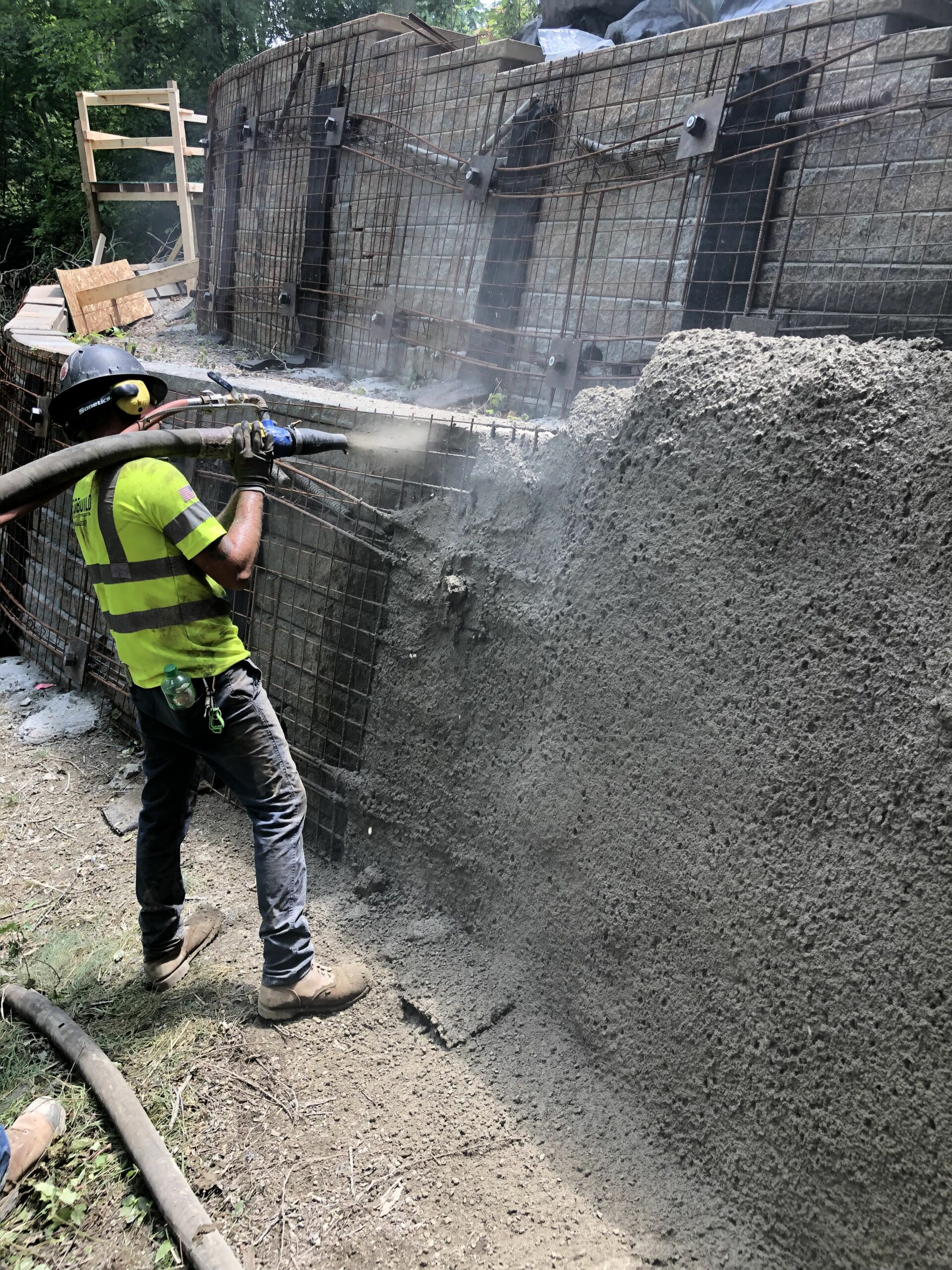 Worker applying shotcrete