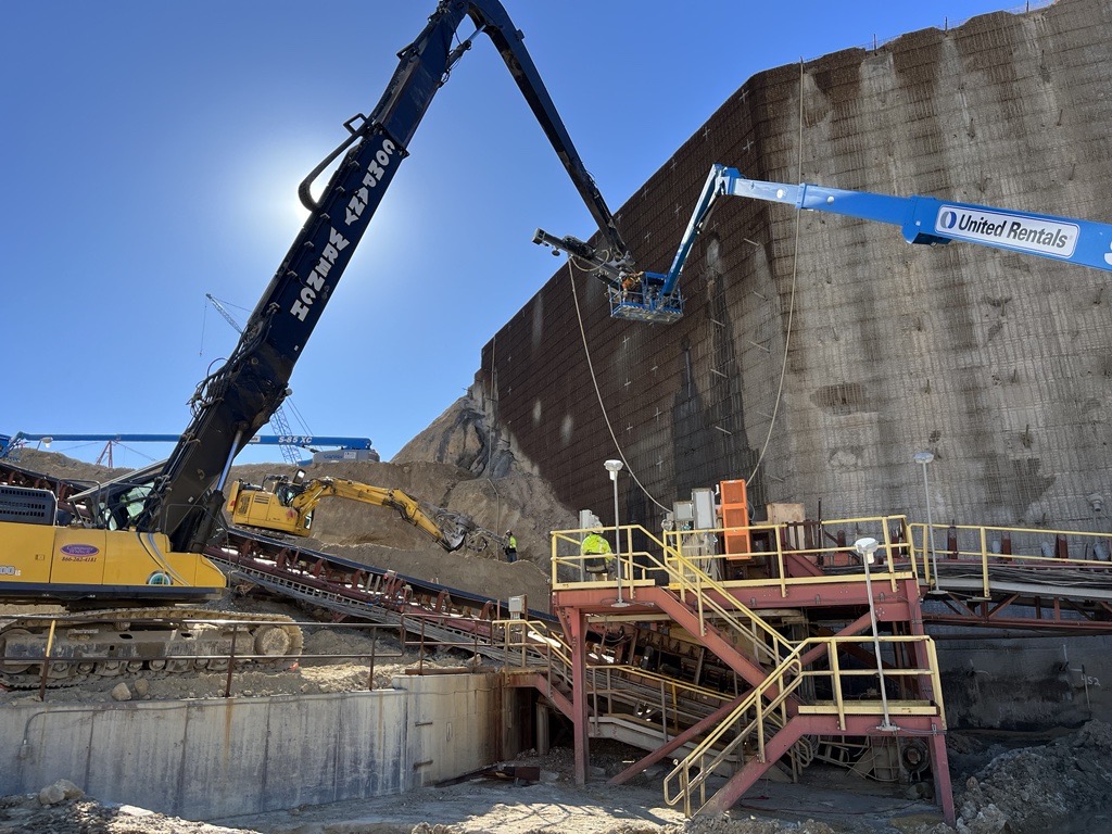 Construction crew working on a large soil nail wall.